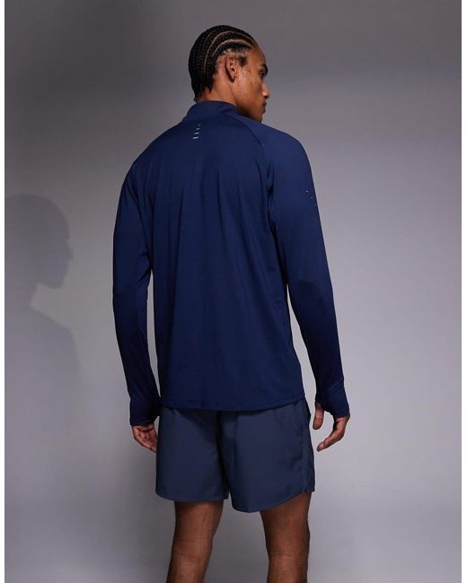 Nike Blue Stride Dri-fit Half Zip Long Sleeve Top for men