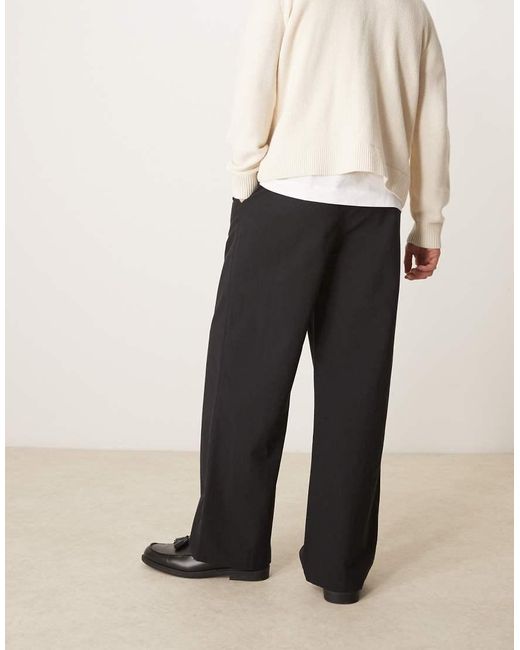 Pantalones Negros De Corte Tapered Extragrande Con Cinturilla Elástica De Mezcla De Algodón Y Lino De ASOS de hombre de color White