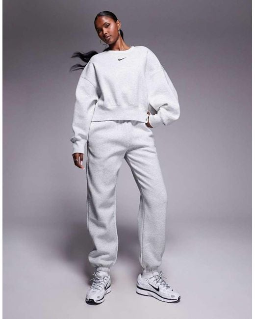Joggers Grises Extragrandes De Talle Alto Phoenix Fleece De Nike de color Blue