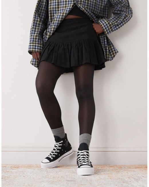 Chuck taylor all star lift - baskets montantes à plateforme avec nœuds et clous Converse en coloris Brown