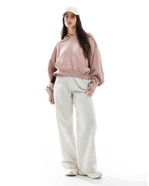 Felpa Con Cappuccio Oversize Con Fondo Asimmetrico Polvere Slavato di ASOS in Pink
