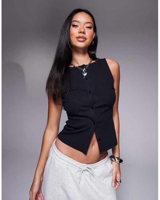 Top Senza Maniche A Coste Con Scollo Largo E Bottoni di ASOS in Blue