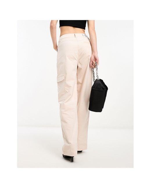 Pantalon taille haute en velours côtelé - beige Calvin Klein en coloris Natural