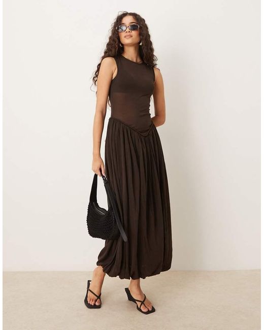 Capsule Rami di Mango in Black