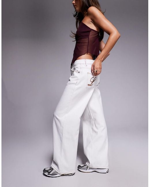 Liquor N Poker Purple baggy Jeans With Tie Front Detail