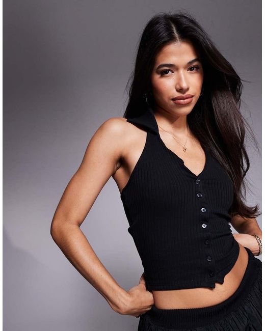 Top Abotonado Con Cuello Halter De River Island de color Blue