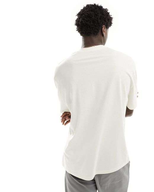 T-shirt oversize avec imprimé fleuri à l'avant - beige ASOS pour homme en coloris White
