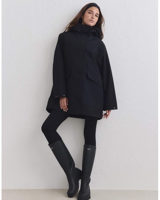 Veste à capuche imperméable e Aim'n en coloris Blue