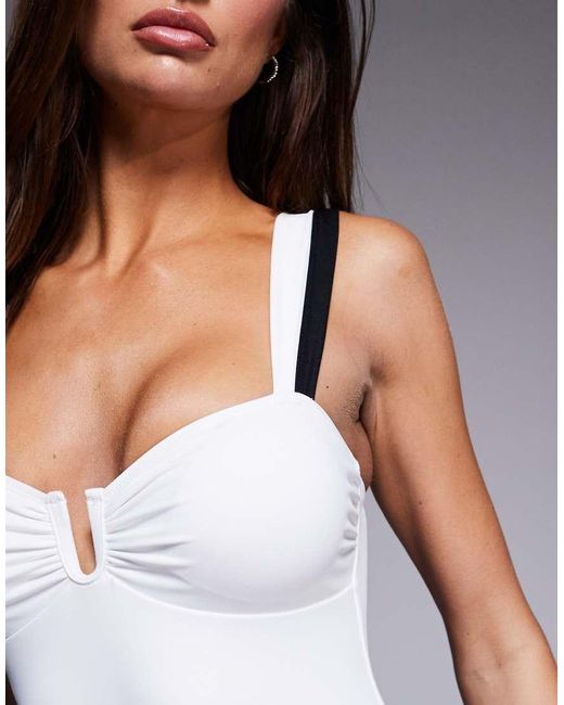 The Frolic White Exclusive Contrast U Bar Detail High Leg Swimsuit