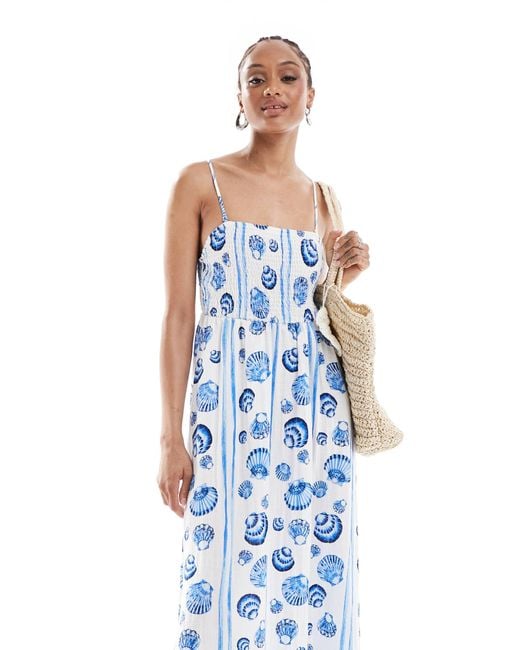 pastel blue bridesmaid dress Blue White Floral Print Shirred Tie Shoulder Cami Dress – Wear.Style main image 1
