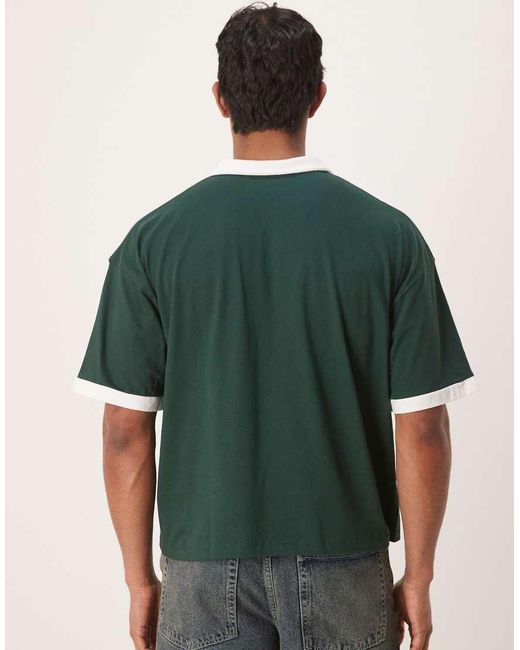 Polo Verde Oscuro De Corte Cuadrado Extragrande Con Estampado Gráfico Deportivo De ASOS de hombre de color Green