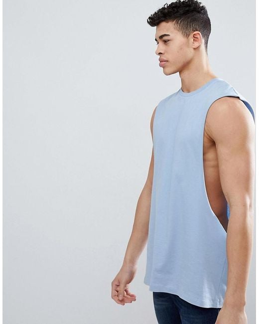 Camiseta larga sin mangas con sisa cada extrema en azul de ASOS de hombre  de color Azul | Lyst