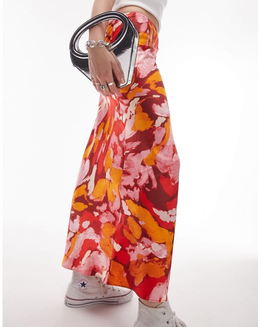 Jupe longue coupée en biais à motif fleuri - orange et TOPSHOP en coloris Red