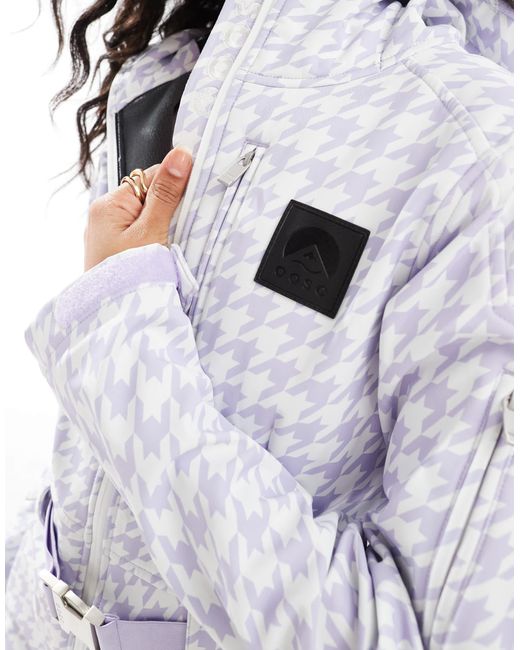 OOSC White – schicker skianzug mit hahnentrittmuster