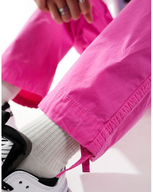 Pantalon cargo coupe large ASOS pour homme en coloris Pink