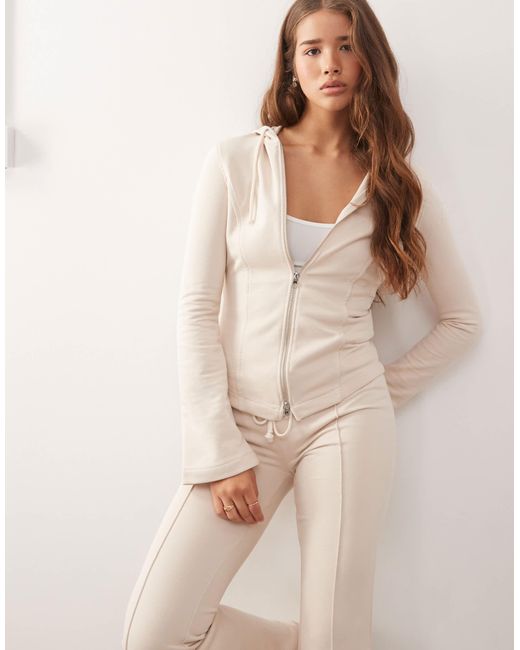 Sweat à capuche ajusté d'ensemble à manches évasées - beige Monki en coloris Natural
