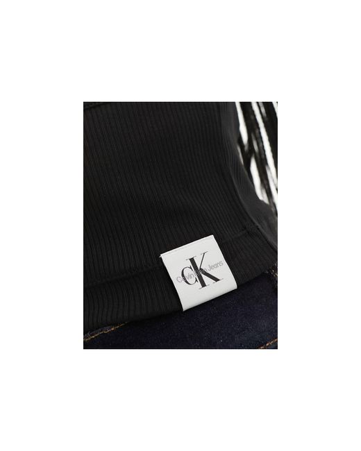 T-shirt slim nera a coste di Calvin Klein in Black
