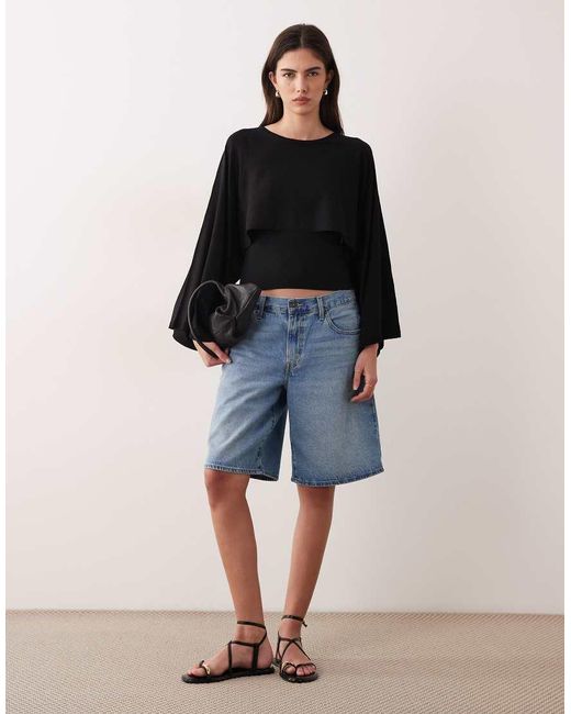 Mango Gebreide Cape in het Black