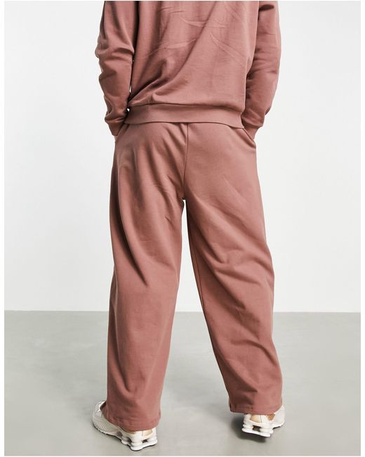 Joggers oversize a fondo ampio slavato da Uomo di ASOS in Marrone | Lyst