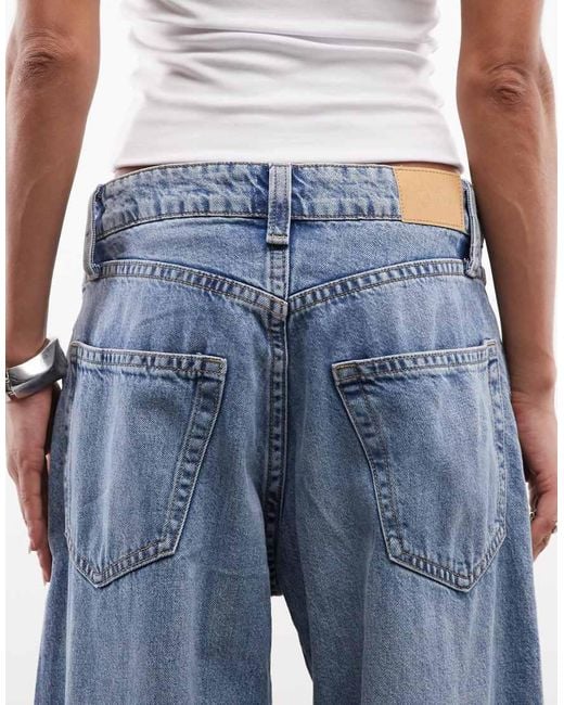 Monki Blue Fold Up Baggy Jeans With Distressing