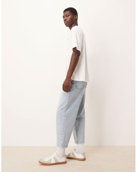 ASOS – lässige karottenjeans mit bundfalten und bleach-waschung in White für Herren