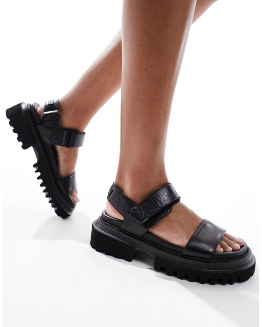 Sandalias negras con plataforma plana AllSaints de color Black