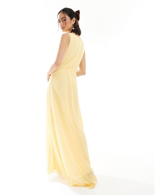 L'invitée - robe cache-cœur longue en mousseline avec jupe portefeuille - citron TFNC London en coloris Metallic