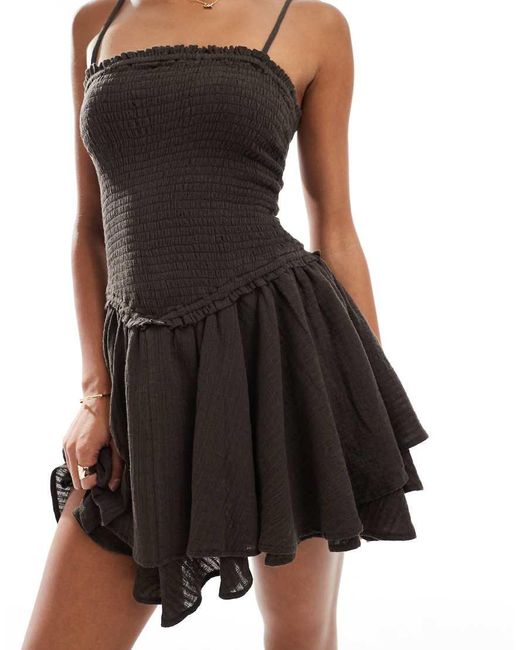 Stradivarius Gesmokte Mini Jurk Met Korset in het Black