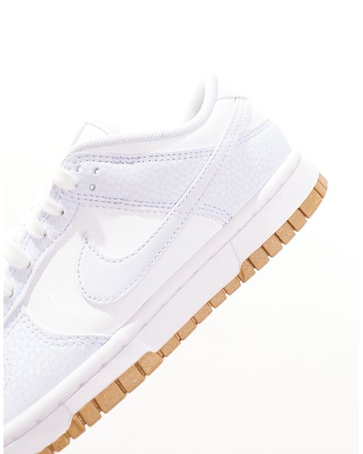Dunk low nn - sneakers premium bianche e grigie di Nike in White