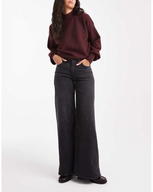 Vaqueros Negro Lavado De Talle Alto Y Pernera Ancha Elástica 728 De Levi's de color Black