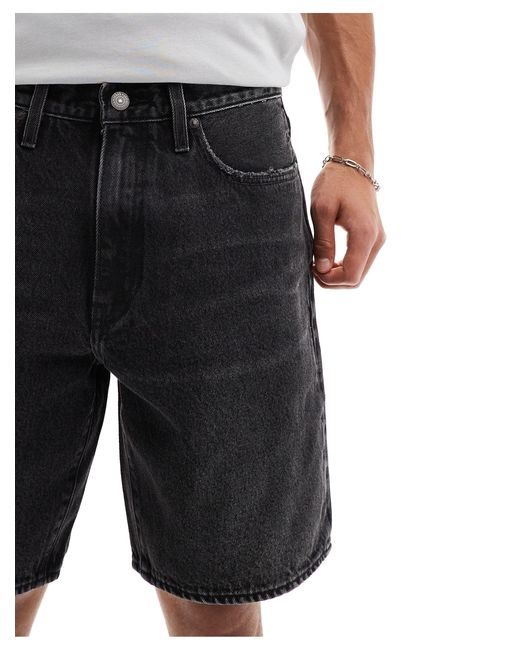 468 - pantaloncini di jeans ampi slavato di Levi's in Black da Uomo