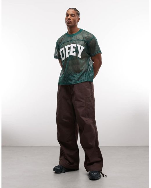 Obey Green Collegiate Practive Mesh Jersey Top for men