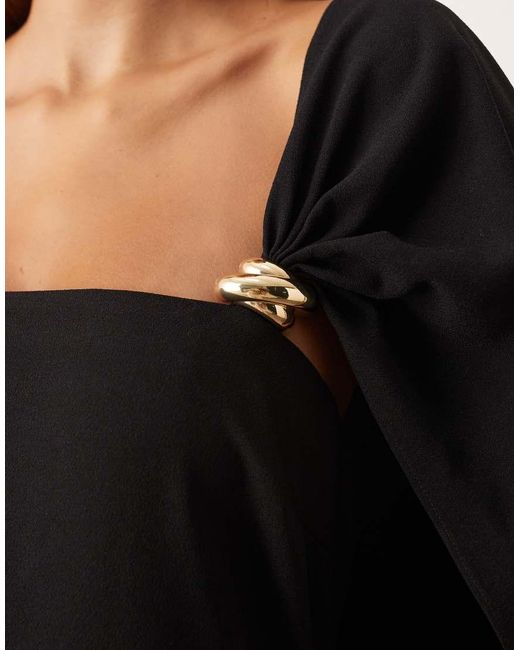 ARRANGE Black Cape Sleeve Mini Shift Dress With Metal Trim Detailing