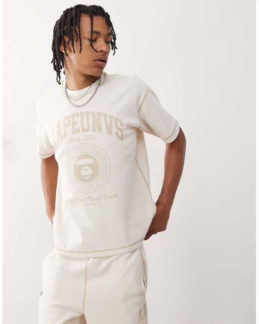 Camiseta Blanco Hueso Con Diseño Reversible Y Logo Universitario De Aape By A Bathing Ape Aape By A Bathing Ape de hombre de color White