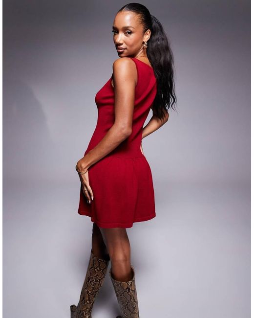 Vestido Corto De Corte Skater Sin Mangas Con Cuello Ancho Y Botones De Punto Exclusivo De Kaiia de color Red