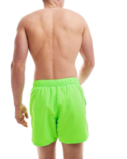 Pantaloncini da bagno corti fluo di ASOS in Green da Uomo