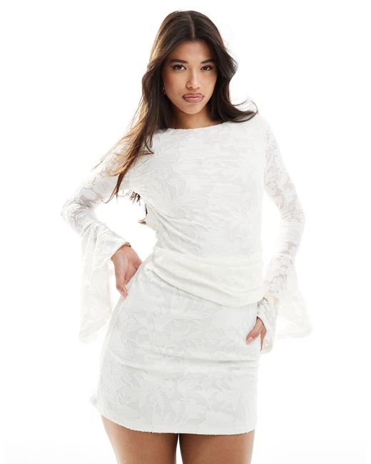 Robe courte en dévoré avec dos échancré et poignets larges - ivoire ASOS en coloris White
