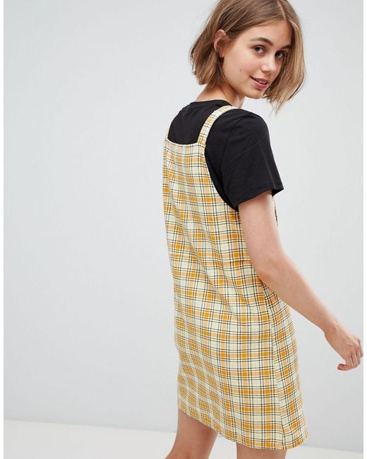 yellow overalls dress