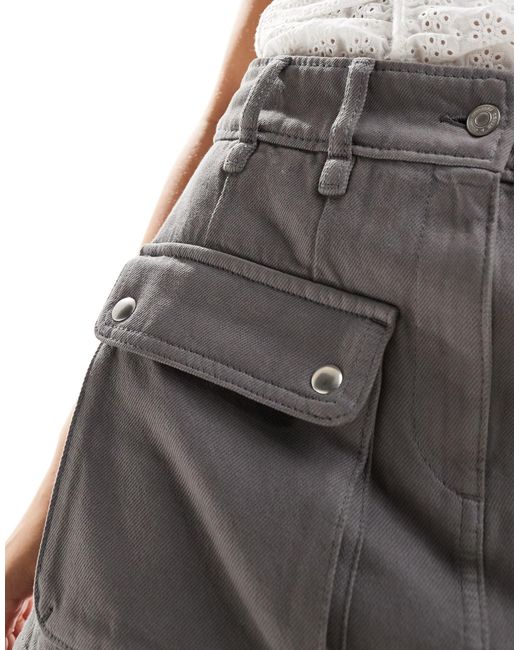 Mini-jupe à poches plaquées et détails zippés - gris & Other Stories en coloris Gray