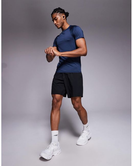 4505 – körperbetontes baselayer-trainings-t-shirt aus schnell trocknendem material in Blue für Herren