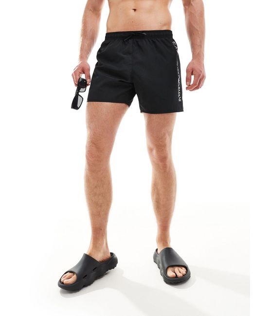 Armani - pantaloncini da bagno neri con logo laterale verticale di EA7 in Black da Uomo