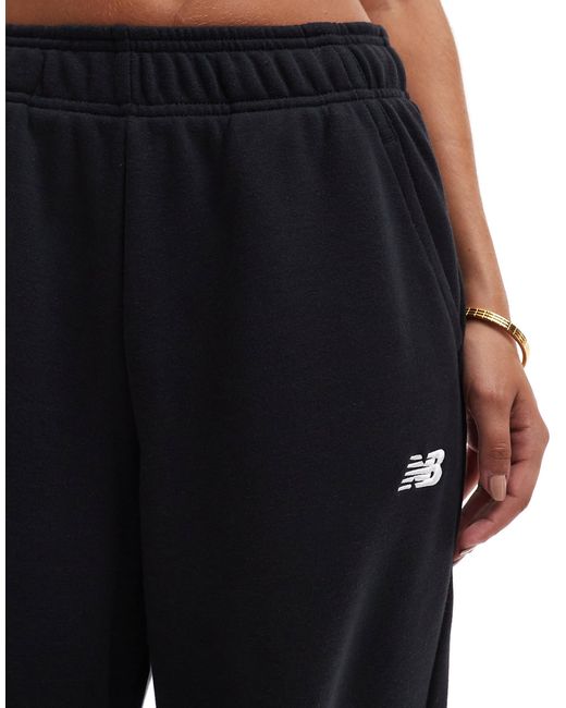 Sport essentials - pantalon New Balance en coloris Blue