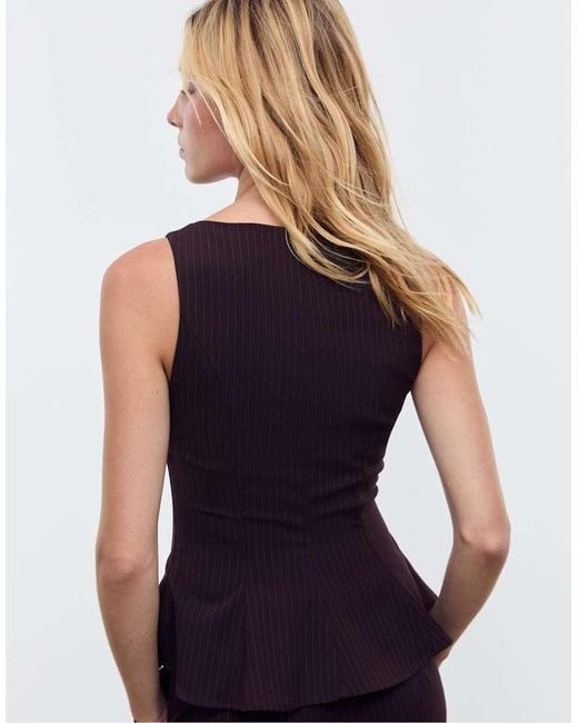 Top A Righe Senza Maniche Stile Peplo di Stradivarius in Black