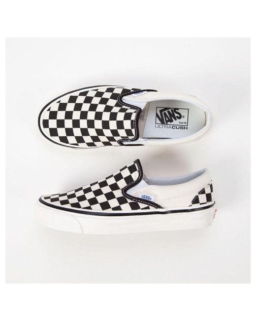 vans classic slip on black black womens trainers