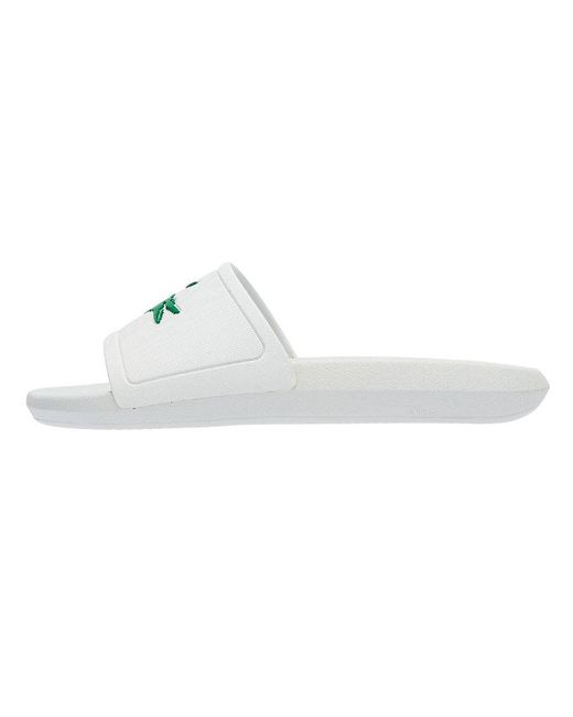 green lacoste sliders