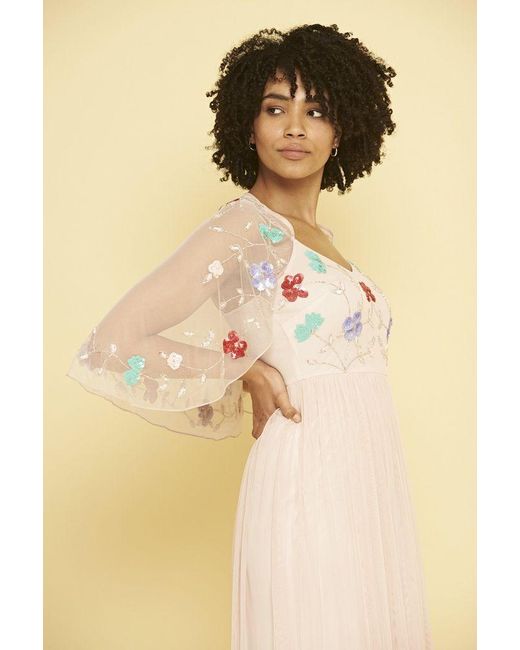 frock and frill cape dress