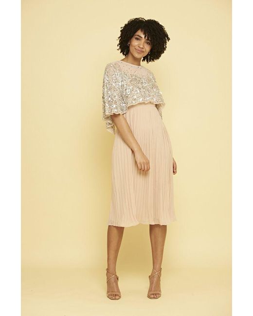 frock and frill cape dress