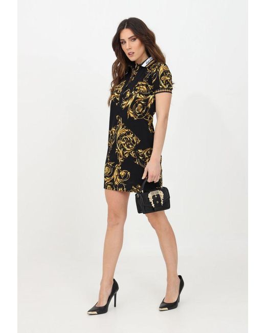Versace Jeans Couture Denim Abito Nero Oro Con Collo A Polo E Stampa  Barocca Da Donna Firmato in Black | Lyst