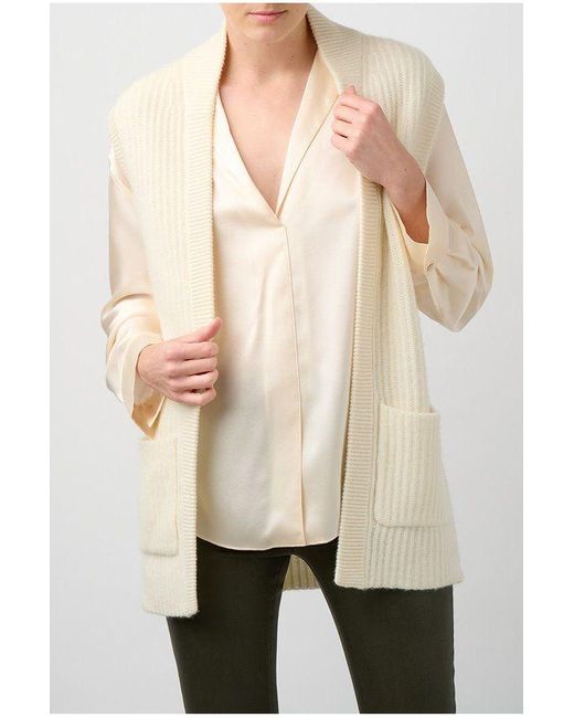 cream sleeveless cardigan