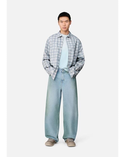Axel Arigato Blue Spray Relaxed Jeans for men